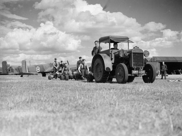 12 A Whitley and bomb towing tractor of 10 OTU RAF Abingdon July 1940 IWM